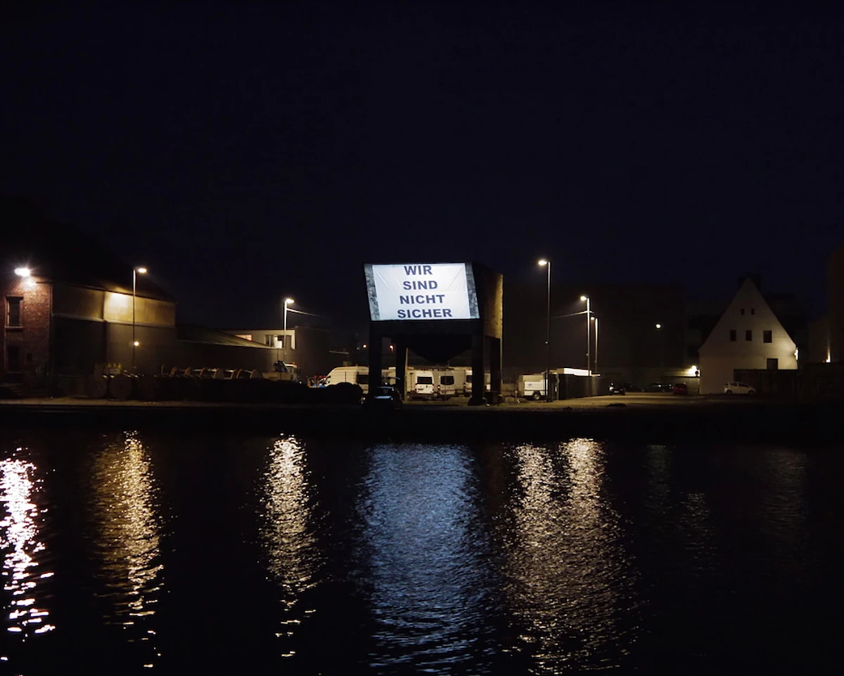 Sicher, Projektion, Hafen, Münster, 2016. Credit: VG Bild-Kunst, Bonn, 2023.